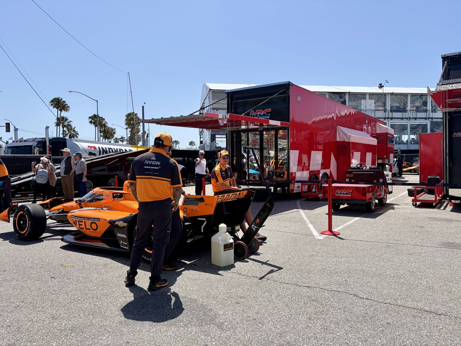 An Arrow McLaren Chevrolet IndyCar and team transporter at the 2026 Acura Grand Prix of Long Beach