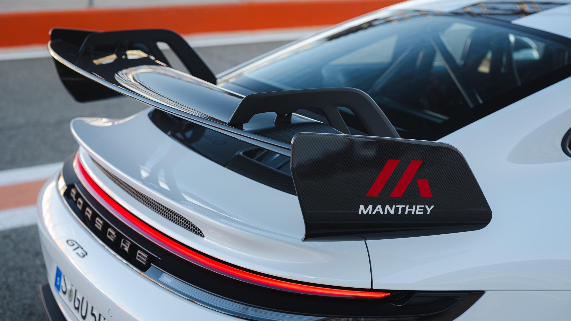 A Porsche 911 GT3 fitted with a Manthey performance kit on track